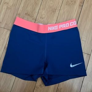 Nike dri-fit royal blue and orange size small spandex shorts but fits like XS